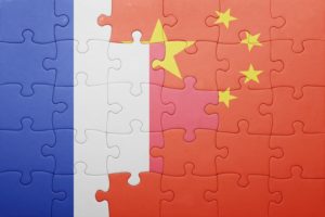 puzzle with the national flag of france and china