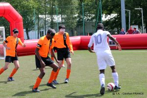 Joueurs de Cécifoot en plein match @T.A.